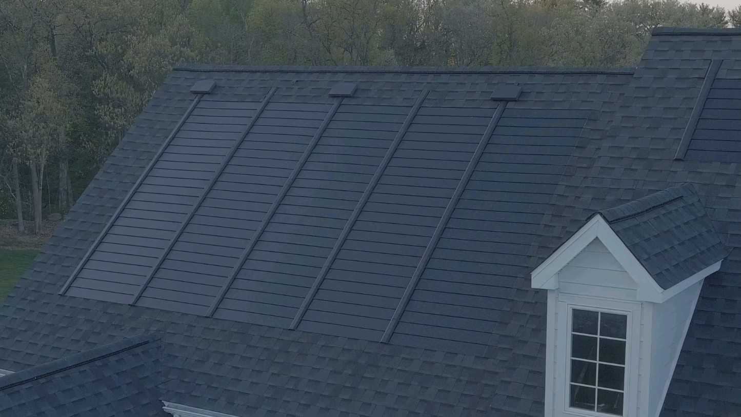 home roof with solar shingles